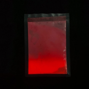 Pó de pigmento vermelho que brilha no escuro